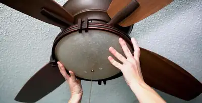 Ceiling fan repair and reinstallation on ceiling mount in Bellevue, NE