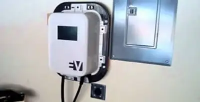 Electric car charger installation with wall-mounted EV charging station in Bellevue, NE