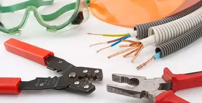 Electrical wiring repair with professional tools and safety equipment in Plattsmouth, NE