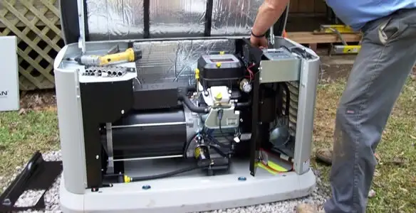 generator installation service showing technician connecting and configuring generator components in Bellevue, NE