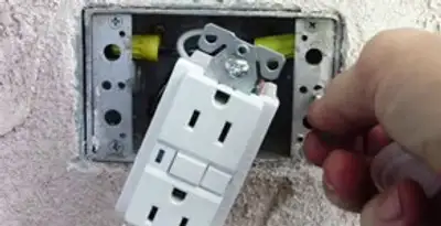 gfci circuits service showing installation of a ground fault circuit interrupter outlet by licensed electricians in Bellevue, NE