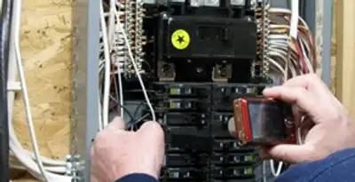 Home electrical inspection of circuit breaker panel by licensed electrician in Bellevue, NE