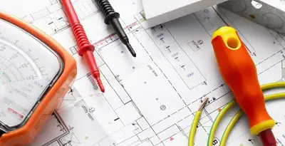 licensed electrician planning and testing electrical systems using professional tools in Bellevue, NE