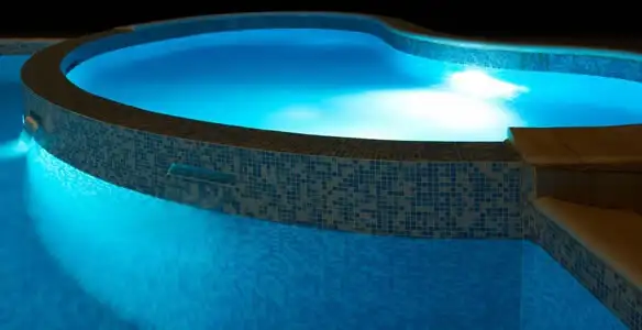 pool light installation and repair services highlighting illuminated pool interior lighting in Bellevue, NE