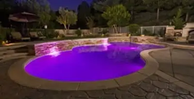 pool light installation and repair services illuminating a residential swimming pool in Bellevue, NE