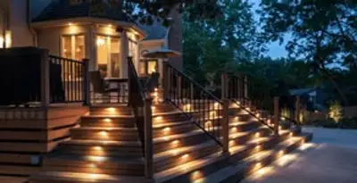 Residential electrician installing outdoor lighting for home safety in Bellevue, NE
