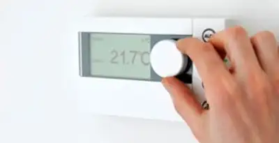 Thermostat installation service with professional adjusting temperature control in Bellevue, NE