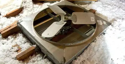 whole house fan installation services with attic-mounted ventilation unit in Bellevue, NE